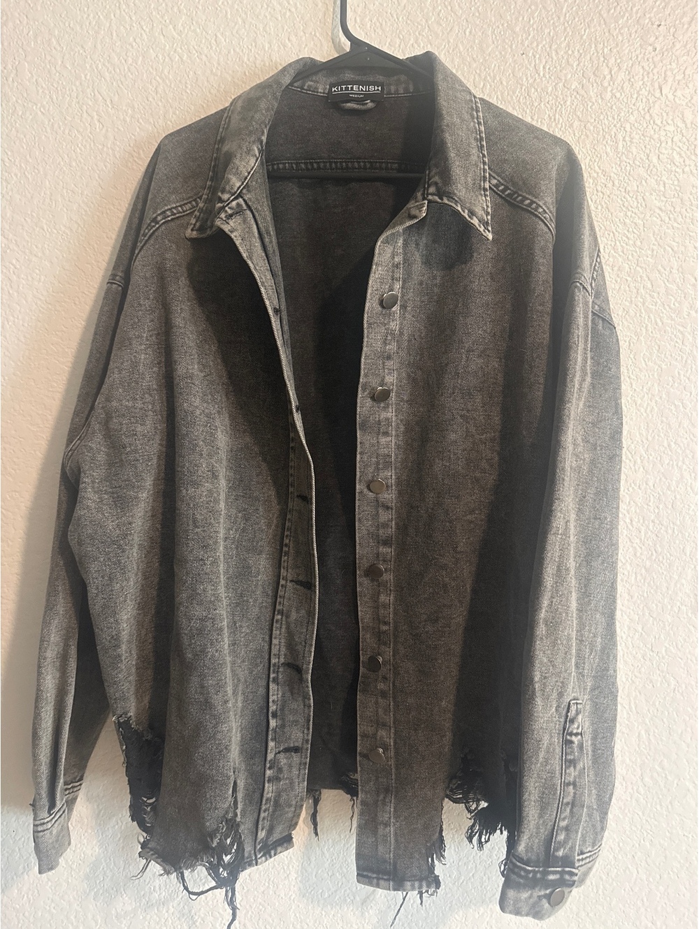 Kittenish Brand Medium Washed Black Distressed Denim Jacket with Frayed Hems